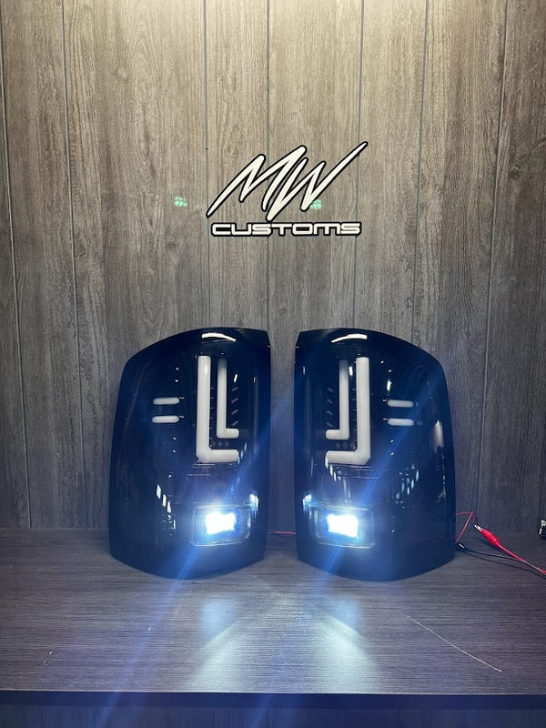 2014-19 GMC SIERRA TAIL LIGHTS FACTORY HALOGEN *PAINTED 8555 + BLUE PODS* (OPEN BOX)